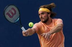 开云体育官网-美国网球队爆冷意大利网球队，西西帕斯统治全场